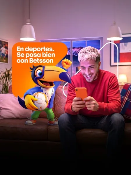 Pieza publicitaria de Betsson con el tucán de la marca junto a un joven sentado en un sofá mirando el teléfono, bajo la frase «En deportes. Se pasa bien con Betsson».
